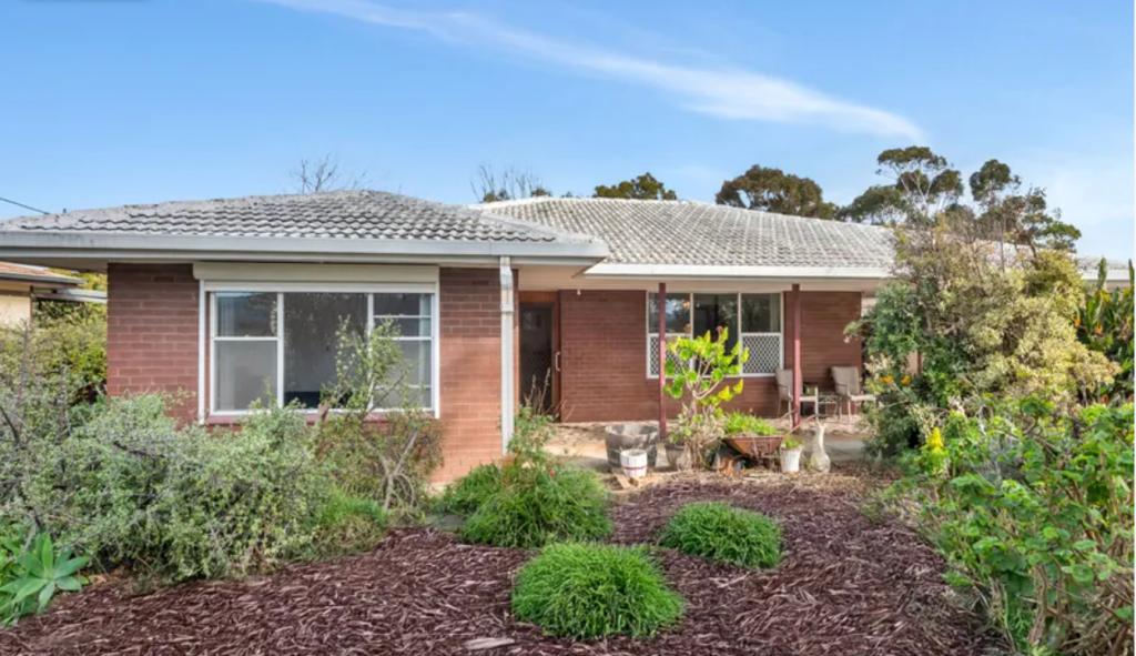 Brick home in McLaren Vale on a large 946m² allotment with established gardens, ideal for future subdivision potential.