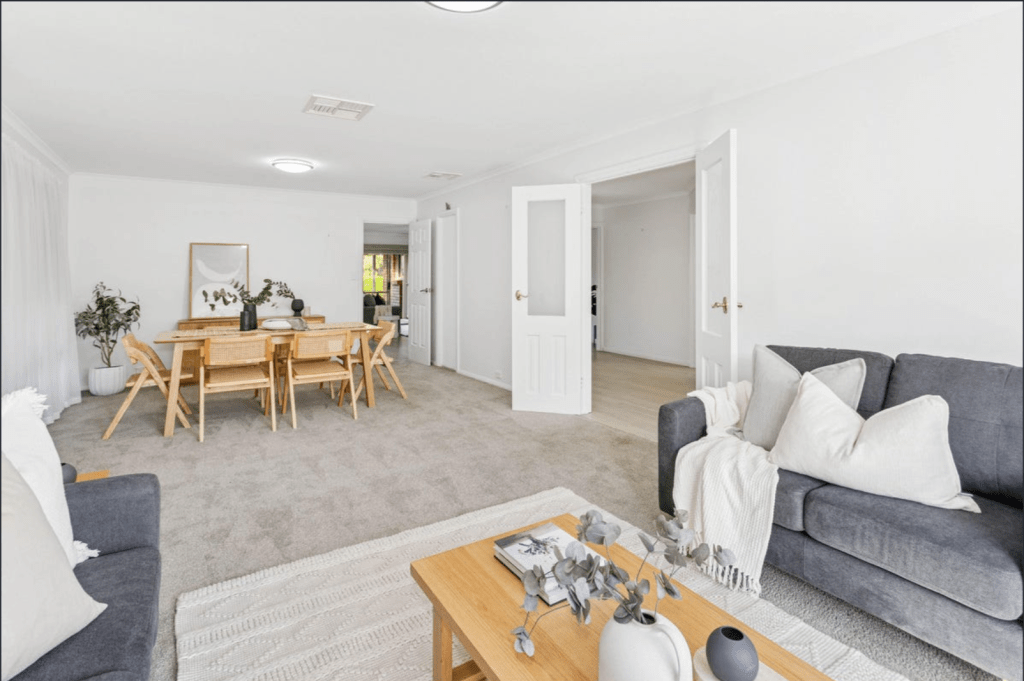 Spacious open-plan living and dining area with multiple living zones — family home secured in 2 weeks by 28th Street Agency, Greenwith SA